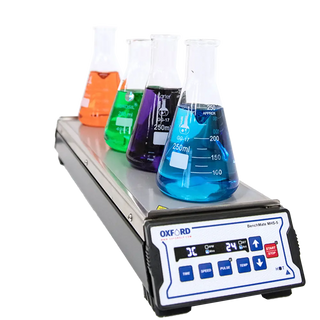 Oxford BenchMate MHS-5 Multi-Position Magnetic Hotplate Stirrer with beakers containing colored liquids on a white background