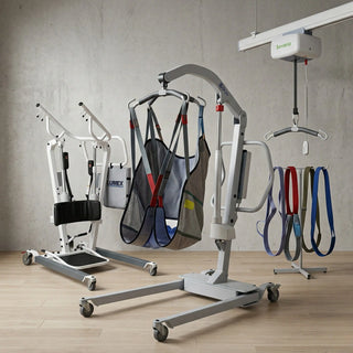 Caregiver safely transferring a patient using a heavy-duty bariatric patient lift with an adjustable wide base