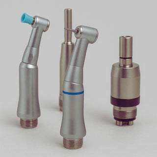 Low speed dental handpieces including contra angle, straight and prophy handpieces displayed with attachments