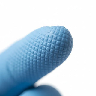 Aquasoft nitrile exam glove texture detail — powder-free, standard cuff, fingertip grip surface