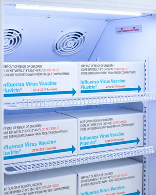 Influenza virus vaccine boxes in a Accucold ARS6PV-AFZ1PVSTACKLHD 24" Wide All-Refrigerator/Freezer Combination