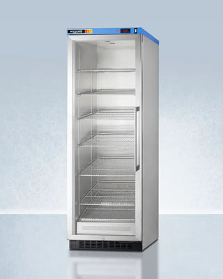 Commercial Blanket Warmer with glass door on a light blue background