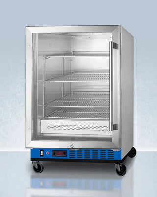 Commercial Blanket Warmer with glass door on a light blue background
