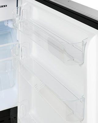 Close-up of a refrigerator door with a clear crisper drawer
