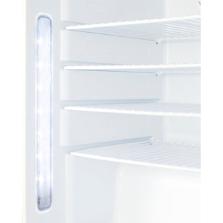Empty Accucold all refrigerator with interior shelves and light on a white background