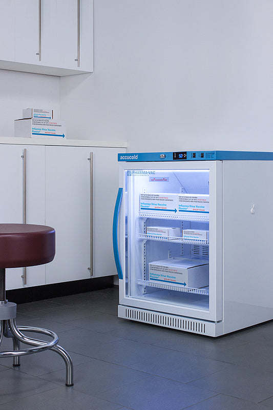Commercial Accucold ARG6PV ADA Height Vaccine Refrigerator refrigerator in a kitchen setting with cabinets and a stool.