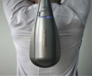 Air Relax Hammerz massager used on the upper back
