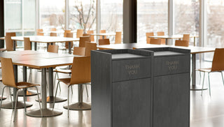 Alpine Industries ALP476-BLK pair of woodgrain enclosures in a cafeteria