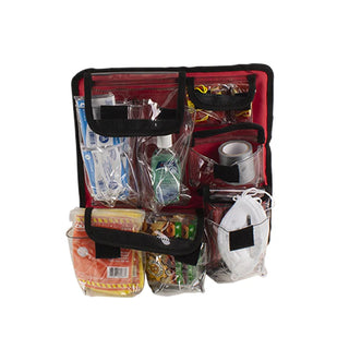First aid kit with various supplies on a white background