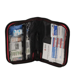 Open first aid kit with various supplies on a white background