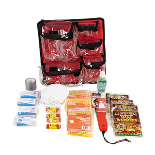 First aid kit with various supplies on a white background