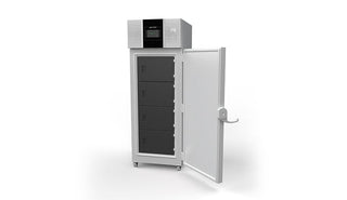 Commercial Ultra Low Temp Upright Freezer with open door on a white background