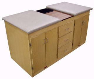 Bailey Manufacturing Model 26 Dual Taping Station with cushioned top and storage drawers on a white background