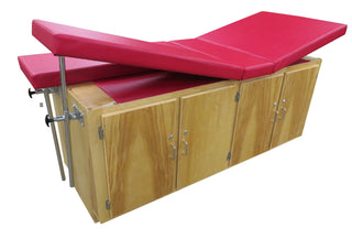 Bailey Manufacturing Model 4311 Full Cabinet Style Sports Medicine Treatment Tables with red cushioned surface on a white background