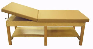 Bailey Manufacturing Model 4516 Adjustable Back Bariatric Treatment Table with curved design on a white background