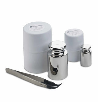 Set of silver containers and tools for Benchmark Scientific Accuris™ Compact Balances on a white background