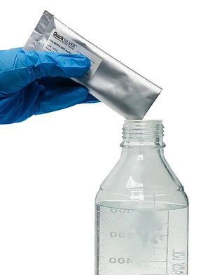 Hand mixing a Benchmark Scientific Accuris™ QuickSilver™ Powdered Buffer Pack with liquid