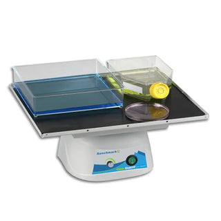 Benchmark Scientific BT30 Orbi-Blotter™ with Non Slip Rubber Mat Platform with a clear lid, blue tray, and yellow object on a white background