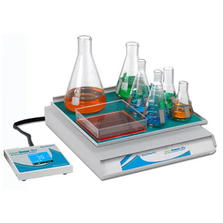 Benchmark Scientific BT4011 Orbi-Shaker™CO2 XL Orbital Shaker with Remote Controller with beakers containing colored liquids on a white background