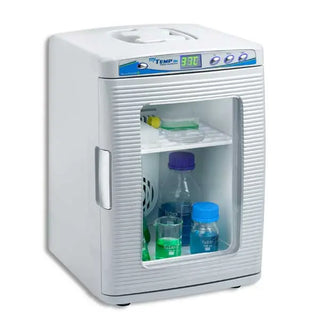 Small white Benchmark Scientific myTemp™ Mini Digital Incubator with glass door containing bottles and containers on a white background