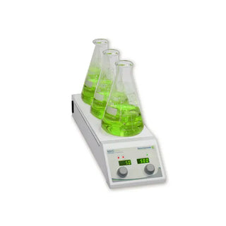 Benchmark Scientific MHS-3 Three position Hotplate Stirrer2 with three beakers containing green liquid on a white background
