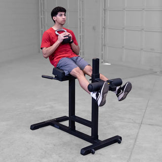 Body-Solid GRCH322B Roman Chair features dual-axis adjustment, oversized 8" foam rollers, and a heavy-duty steel frame for effective core and back workouts. Shop now!