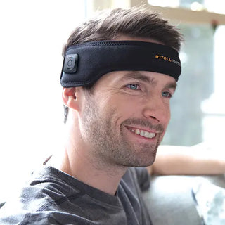 Black Intellinetix Headache Therapy Band with adjustable strap and integrated rechargeable vibration module for targeted forehead therapy.