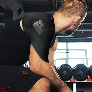 Black Intellinetix Universal Therapy Wrap with integrated vibration module and adjustable wrap designed for targeted therapy on multiple body areas.