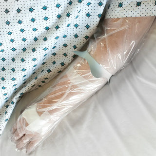 SEAL-TIGHT SealBand single-use dressing protectors for arm and leg with transparent moisture-resistant sleeves, individually packaged in boxes of 50 for protecting casts, PICC lines, IV sites, and surgical sites.