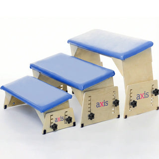 Set of three step stools with blue platforms and visible 'axis' branding on a white background