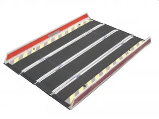 Clarke Healthcare MPEBXX DECPAC Fiberglass Portable Wheelchair Van Ramp with Edge Barrier with red top and black surface on a white background