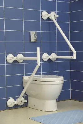 White toilet with Clarke Healthcare R140026XSU Mobeli QuattroPower Support Angle Adjustable Grab Bar  installed on a blue tiled bathroom wall.