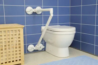Toilet with a Clarke Healthcare R140026XSU Mobeli QuattroPower Support Angle Adjustable Grab Bar mounted on a blue tiled wall