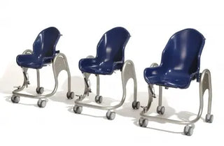 Three blue Clarke Healthcare S5204X00A Boris Size 4 Pediatric Shower Chair  with silver frames on wheels against a white background