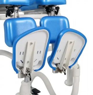 Blue and white Clarke Healthcare Z68950 Divided Tip-up Footrest for Zitzi Starfish Shower Chair on a white background