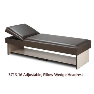 Brown adjustable medical examination table with pillow wedge headrest on a white background