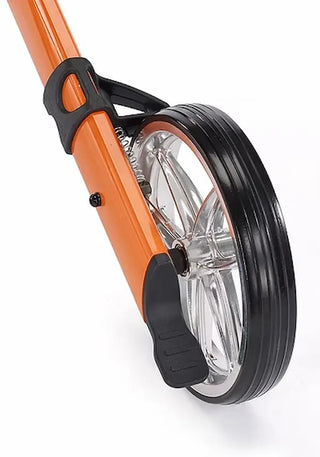 Close-up of a scooter wheel with orange frame and black rim on a white background