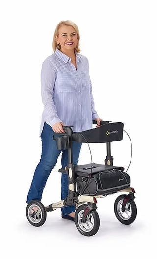 Woman pushing a rollator on a white background
