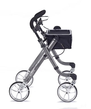 Silver rollator with a black bag on a white background