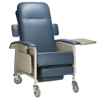 Blue patient recliner chair with wheels and a tray on a white background