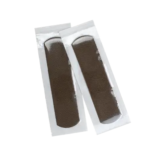 Two Dynarex 3631 ColorFit Adhesive Fabric Bandages Flexible Fabric Absorbent Pad clear packaging on a white background