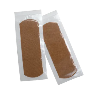 Two brown Dynarex 3636 ColorFit Adhesive Fabric Bandages Flexible Fabric Absorbent Pad patches in clear packaging on a white background