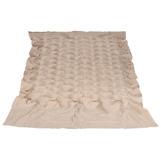 Beige ruffled pillow on a white background