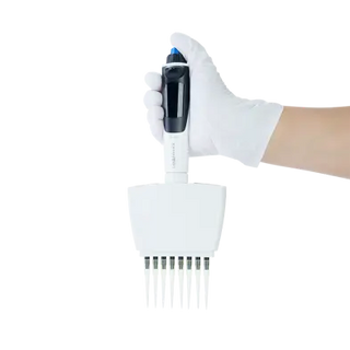 Hand holding a white Dynarex Electronic Pipette 40110 with multiple nozzles against a white background