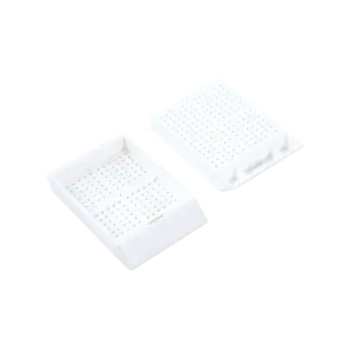 Two white Dynarex LabChoice Embedding Cassette on a white background