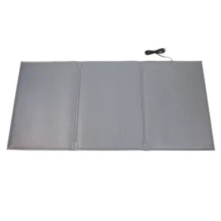 Gray heating pad with a power cord on a white background