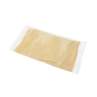 Beige Dynarex XeroBurn Sterile Burn Dressing Blanket patch on a white background