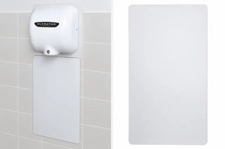 Pair of white plastic wall guards mounted below a hand dryer, providing antimicrobial surface protection and helping keep restroom walls clean, dry, and protected from water splashes.