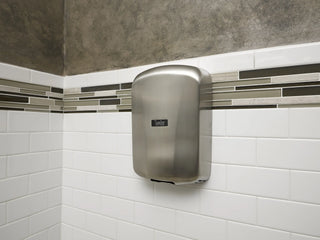 Excel Dryer TA-SB ThinAir hand dryer featuring a brushed stainless steel cover with a satin metallic finish,ultra slim low profile housing,and surface mounted ADA compliant design. The automatic sensor activated unit offers a durable commercial grade appearance with clean modern lines for high traffic restroom environments.