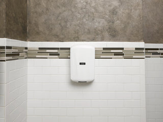 Excel Dryer TA-W White Epoxy Painted ThinAir hand dryer featuring with an ultra slim profile,surface mounted ADA compliant design,and automatic sensor activation. The compact high speed unit offers a clean modern appearance while providing energy efficient hand drying for commercial restroom environments.